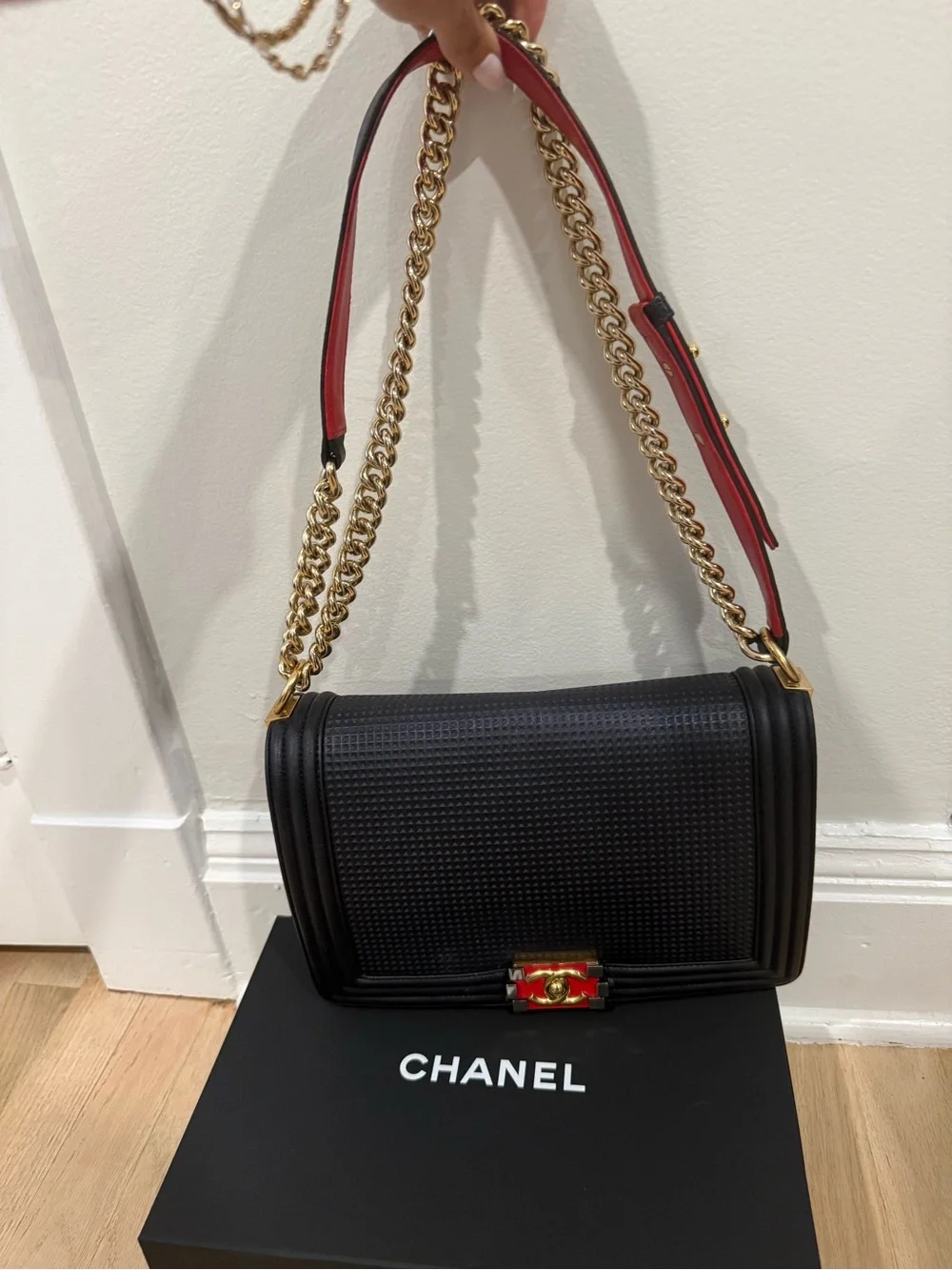 Authentic Chanel Navy Quilted Medium Boy Bag with Red & Gold Accent